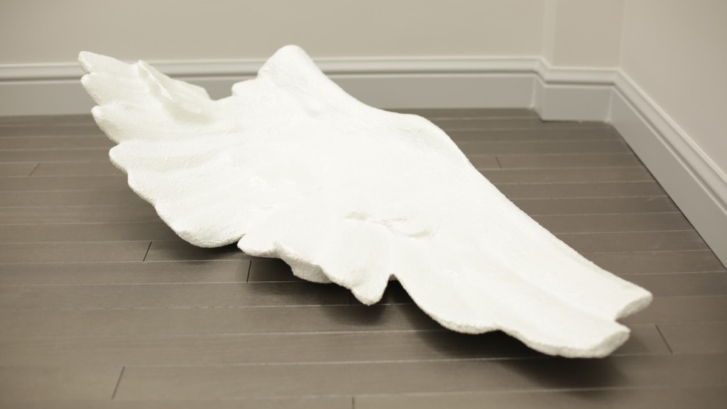 Sibel Horada, “A Fall (A 1:3 Scale Copy of the Gigantic Stone Wing)” [Conference of the Birds], fiberglass resin, crushed marble, 30x110x50 cm, 2013/2016 