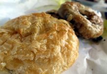 Boyoz: Izmir’s Peerless Pastry with an Intriguing History Photo of two flakey, round pastries served on paper sheet
